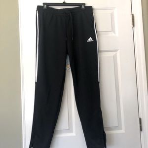 Adidas women’s track athletic pants with zippered bottom and pockets